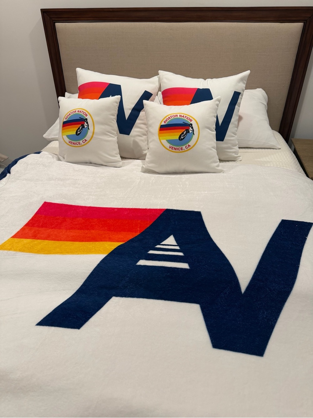 Aviator Nation White Blanket & Pillow Set with Navy Logo and Rainbow Stripes